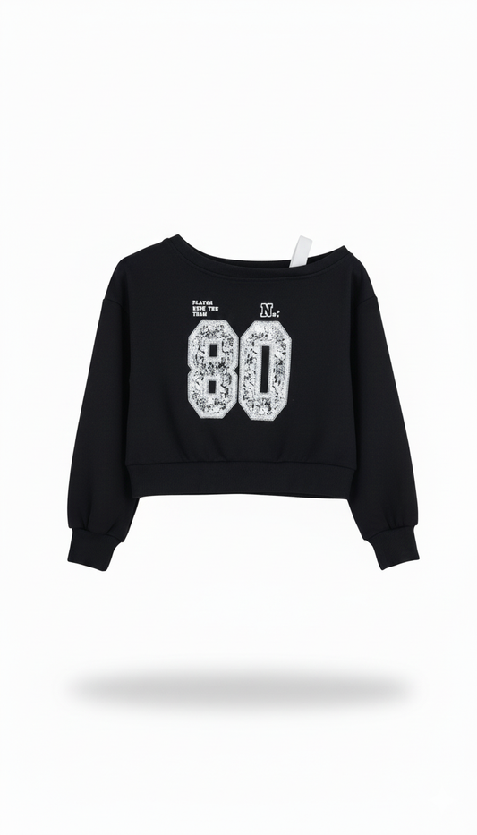 Akyta felpa modello cropped mono spalla con stampa sul fronte ragazza